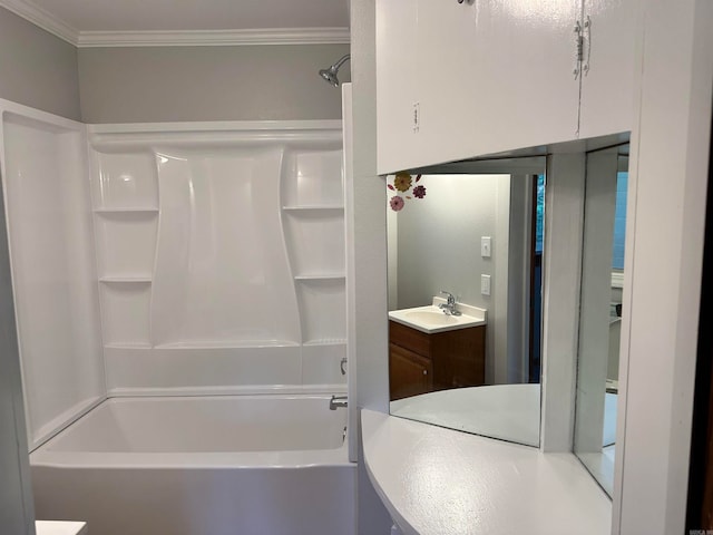 bathroom featuring crown molding, vanity, and tub / shower combination