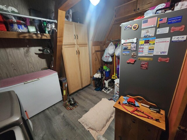 kitchen featuring sink, backsplash, and hardwood / wood-style flooring