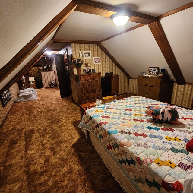 bedroom with carpet flooring and vaulted ceiling