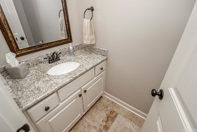 bathroom with tile patterned flooring and vanity