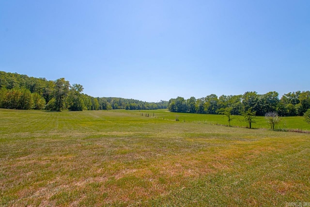 exterior space with a rural view