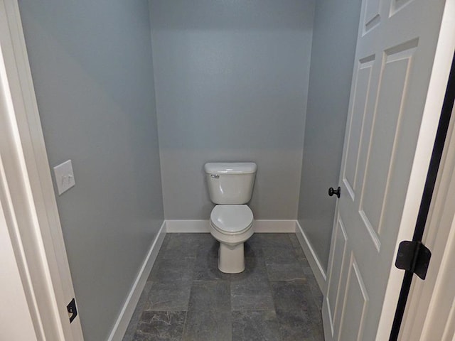 bathroom featuring toilet