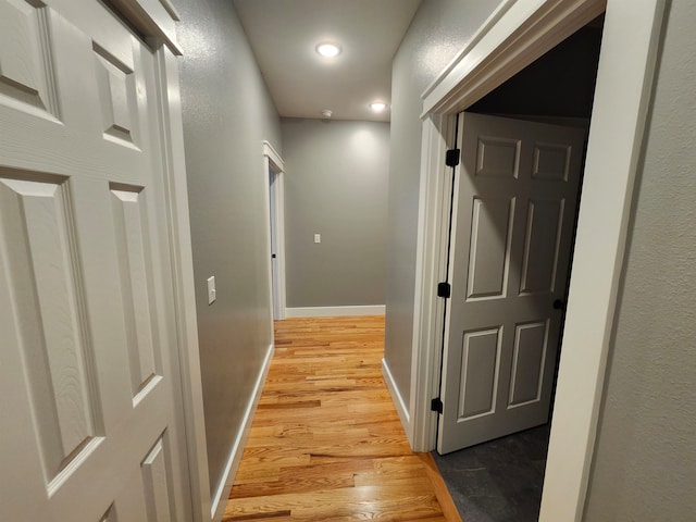 hallway featuring light wood-type flooring