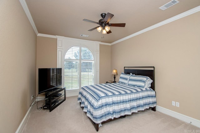 bedroom with carpet flooring, ceiling fan, and ornamental molding