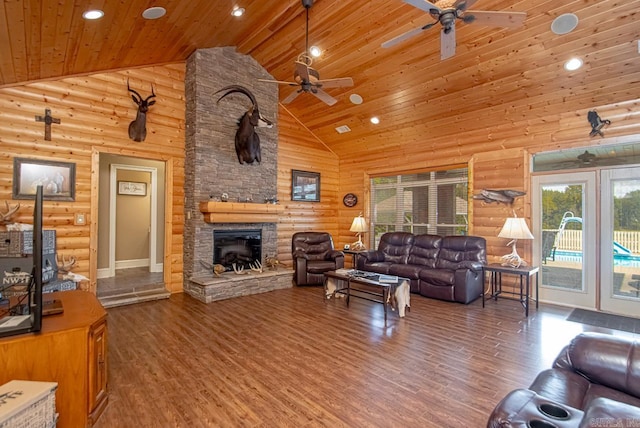 living room with log walls, high vaulted ceiling, and hardwood / wood-style flooring