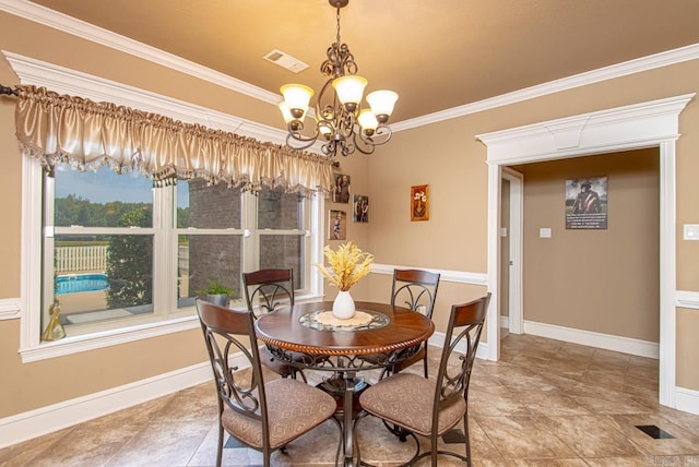 dining space with an inviting chandelier and crown molding