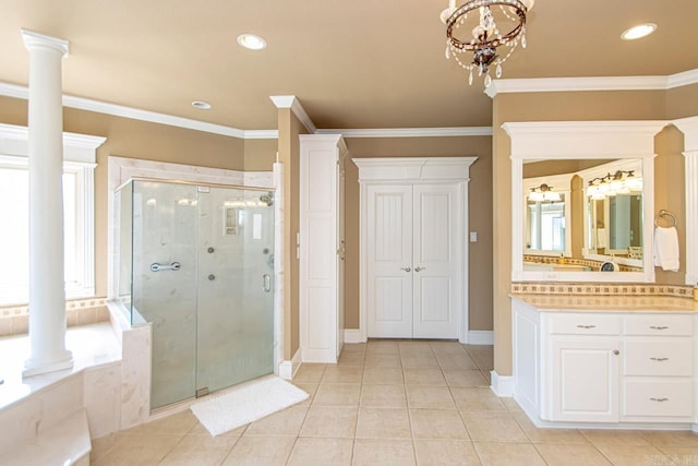 bathroom featuring a wealth of natural light, vanity, independent shower and bath, and tile patterned floors