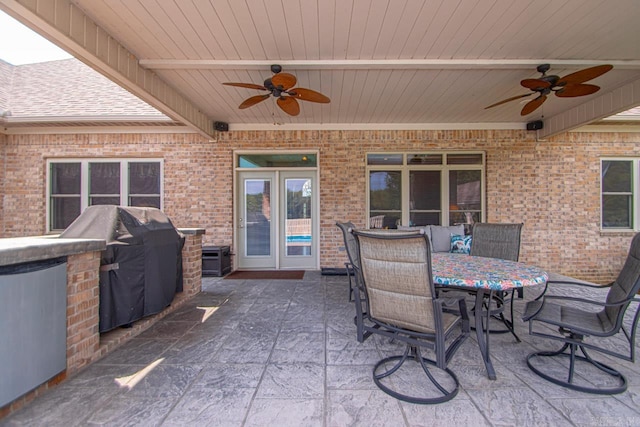 view of patio / terrace featuring grilling area, ceiling fan, and french doors