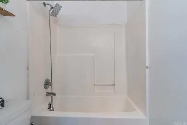 full bath featuring shower / bathing tub combination and toilet