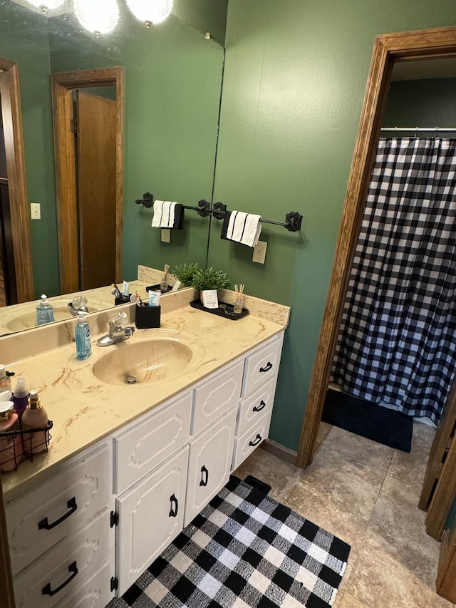 bathroom with vanity and tile patterned floors