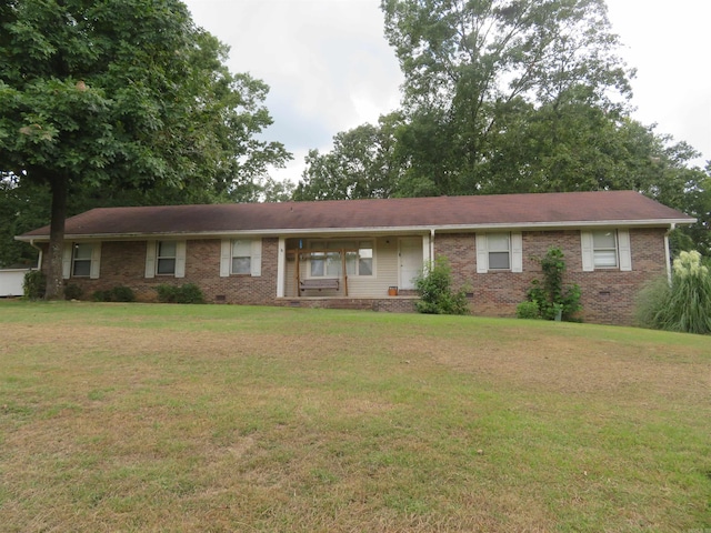 single story home with a front lawn, crawl space, and brick siding
