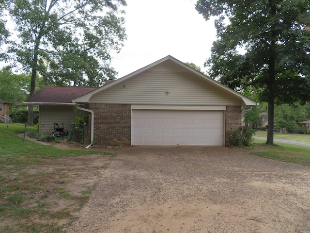 single story home with a garage