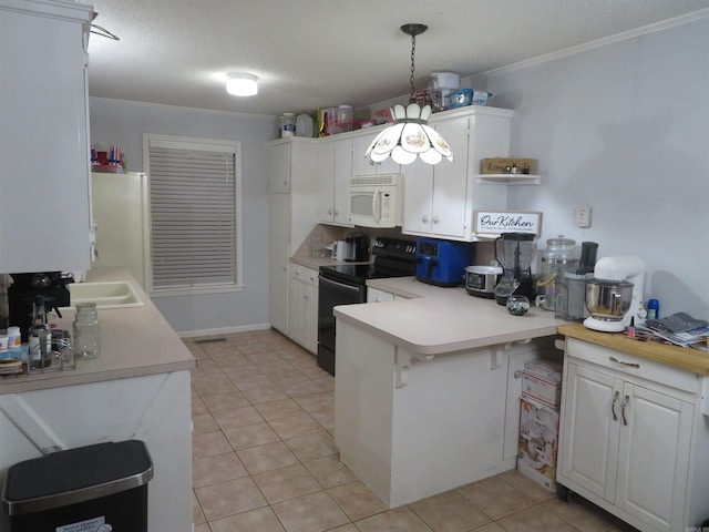 kitchen with kitchen peninsula, sink, black / electric stove, pendant lighting, and white cabinetry