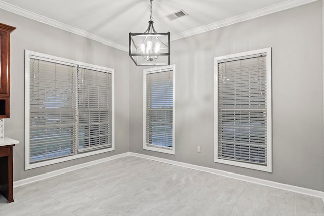 unfurnished dining area featuring an inviting chandelier, baseboards, visible vents, and crown molding