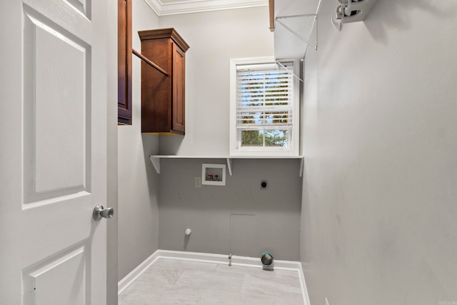 washroom with gas dryer hookup, washer hookup, baseboards, cabinet space, and electric dryer hookup