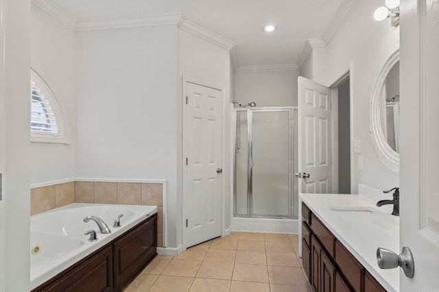 bathroom featuring crown molding, a tub with jets, a shower stall, and tile patterned floors