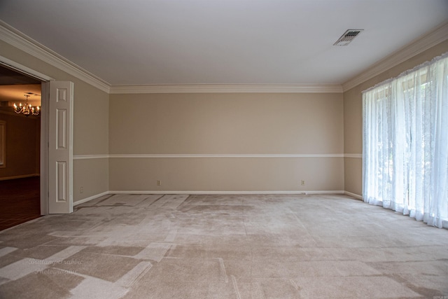 carpeted empty room with crown molding, plenty of natural light, and a notable chandelier