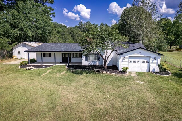 single story home featuring a front yard and covered porch