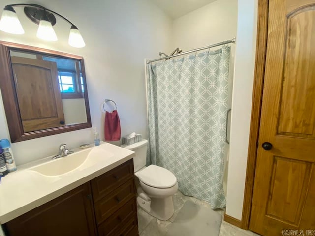 bathroom with a shower with shower curtain, toilet, and vanity