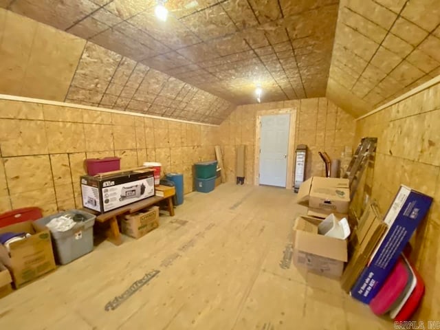 additional living space with lofted ceiling