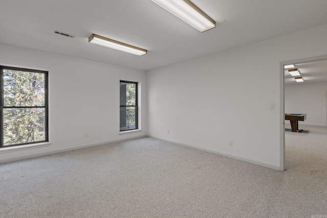 carpeted spare room featuring billiards