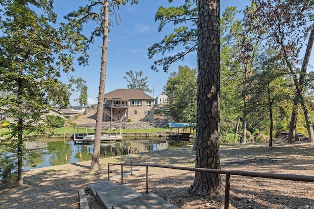 dock area featuring a water view