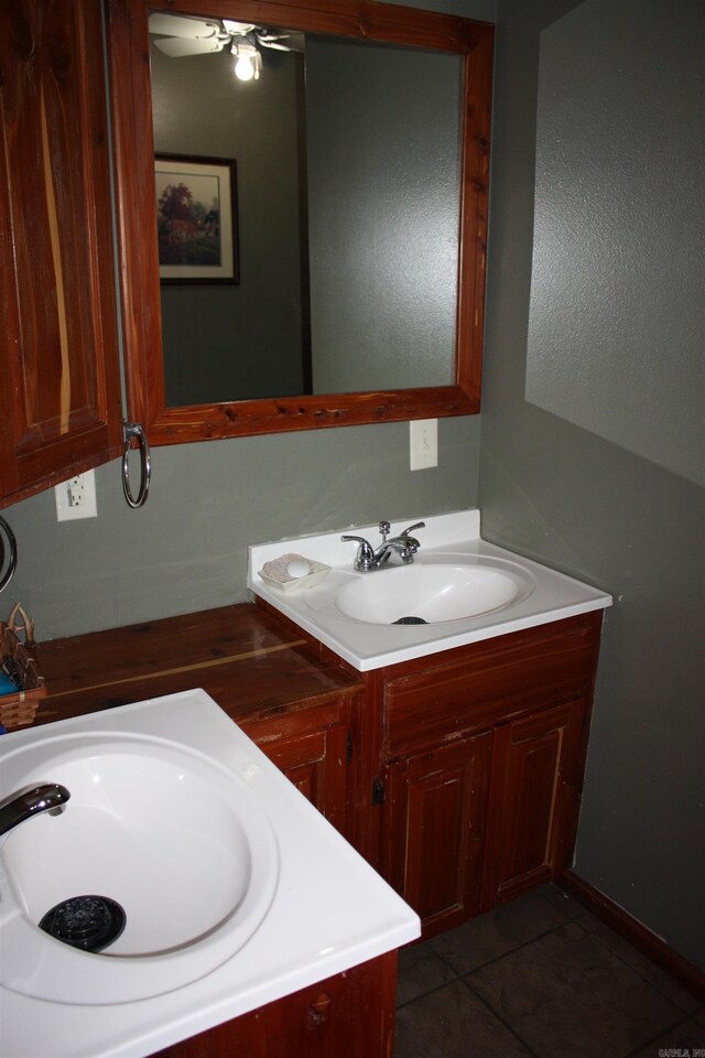 bathroom featuring vanity and tile patterned flooring