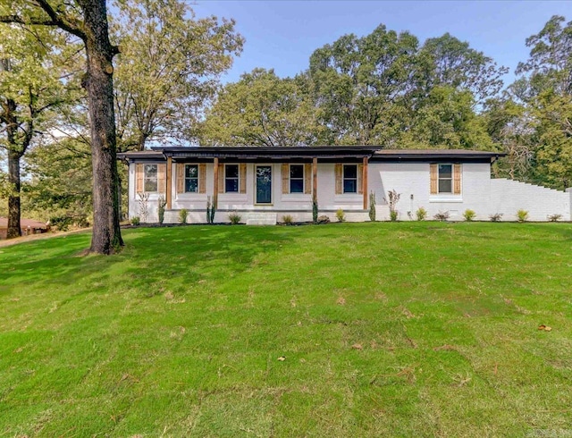 ranch-style house with a front lawn