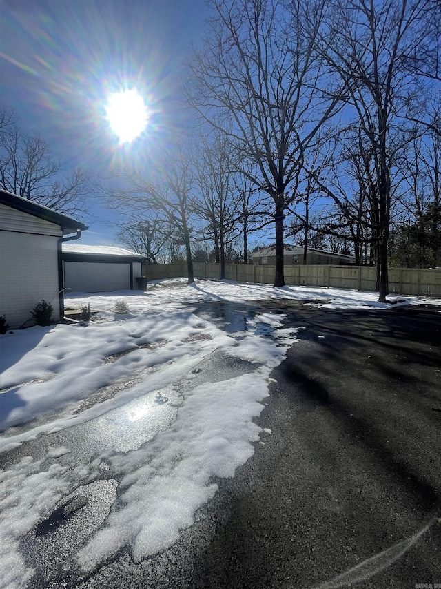 view of yard covered in snow