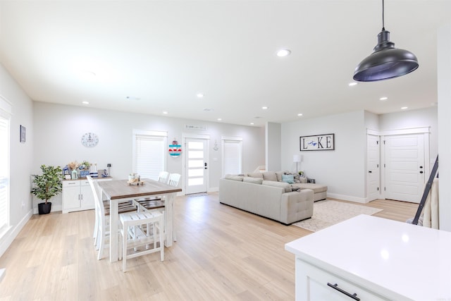 living room with light hardwood / wood-style floors