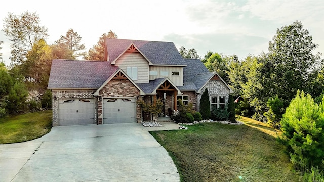 view of front of home featuring a garage and a front lawn