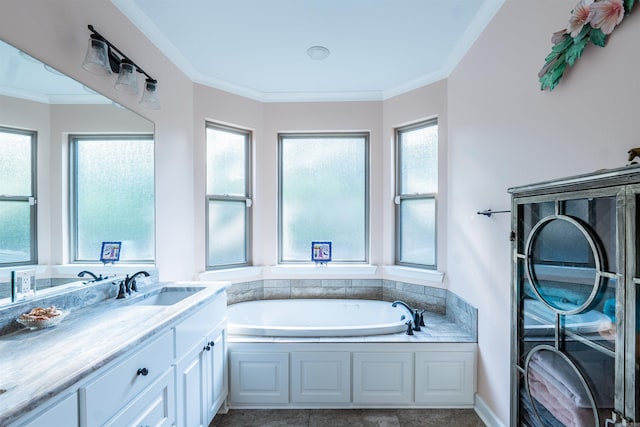 bathroom with tile patterned flooring, vanity, ornamental molding, and a washtub