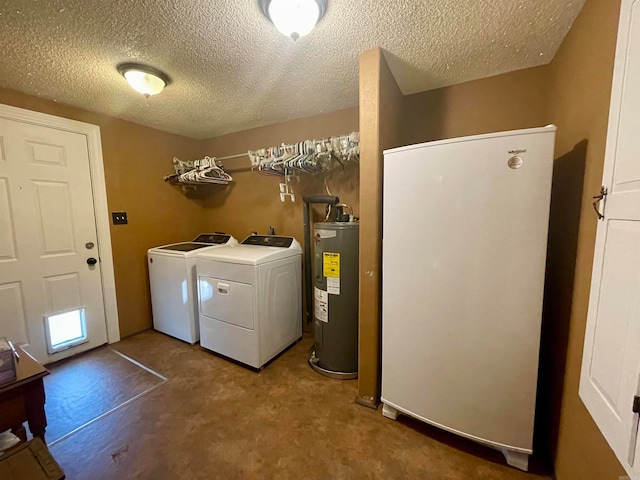 laundry area featuring independent washer and dryer, a textured ceiling, and electric water heater