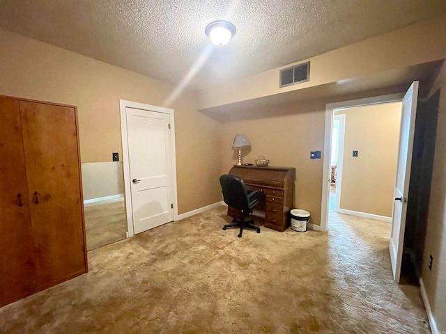 office featuring a textured ceiling