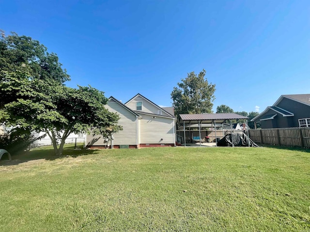 view of yard featuring a carport