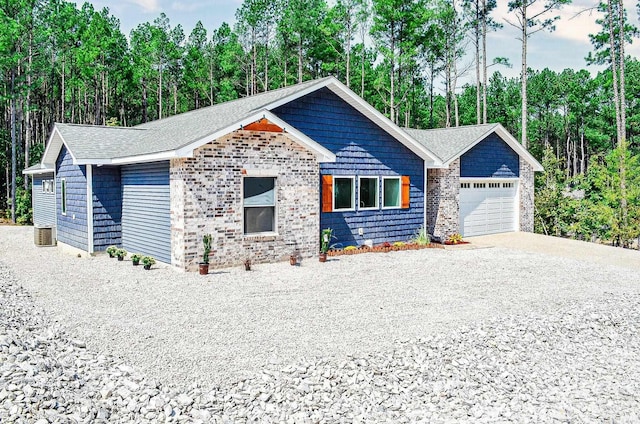 ranch-style home featuring a garage