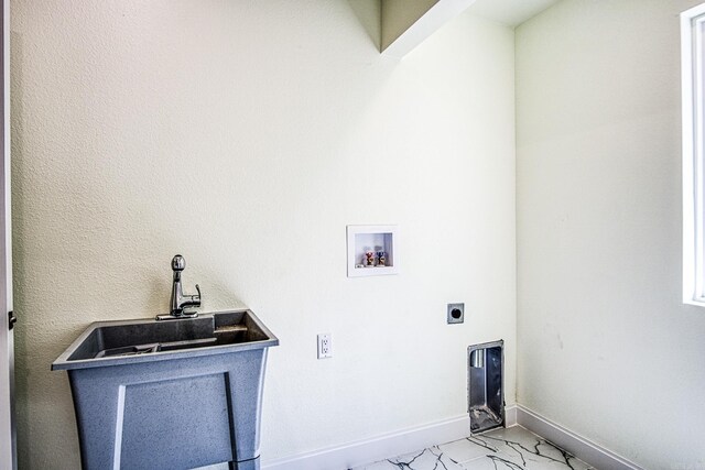 laundry area with hookup for a washing machine, laundry area, baseboards, marble finish floor, and electric dryer hookup