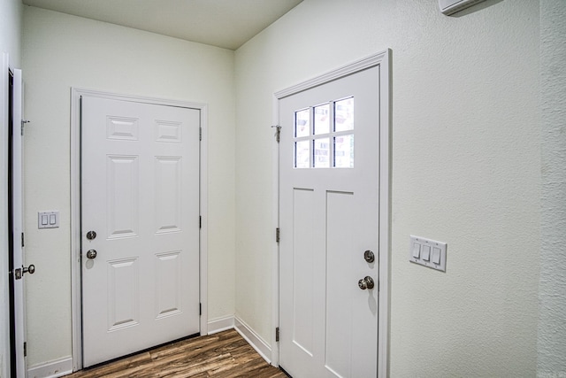 foyer entrance featuring dark hardwood / wood-style flooring