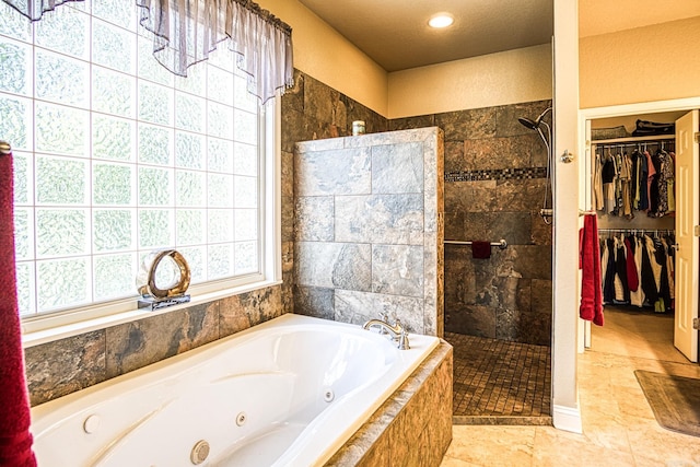 bathroom featuring plus walk in shower