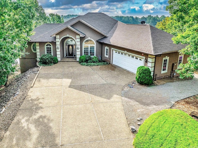 ranch-style home with a garage