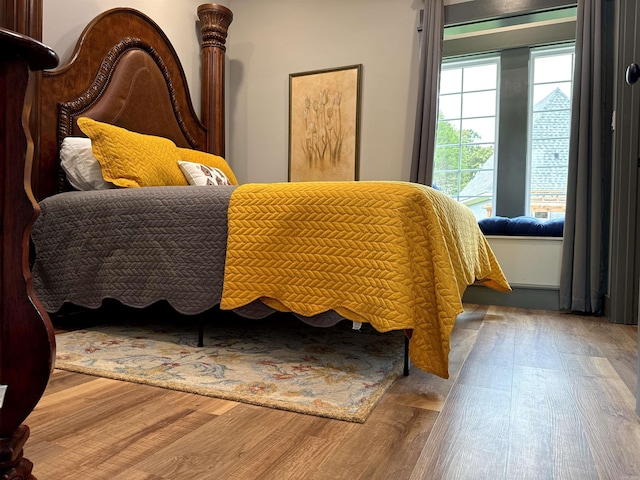 bedroom featuring hardwood / wood-style flooring