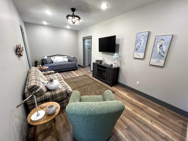51 Yosemite Dr, Cherokee Village, AR 72529 - living area featuring wood finished floors, baseboards, and recessed lighting