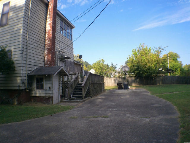 view of home's exterior with a yard