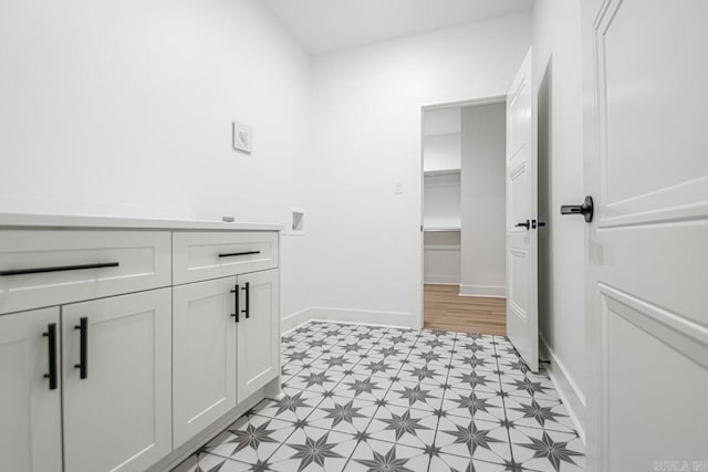 bathroom with wood-type flooring