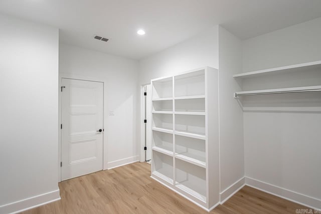 walk in closet featuring light wood-type flooring