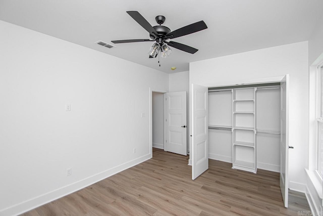 unfurnished bedroom featuring a closet, ceiling fan, and light hardwood / wood-style floors