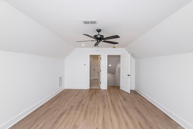 bonus room featuring vaulted ceiling, light hardwood / wood-style flooring, and ceiling fan