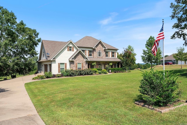 24 W Jericho Dr, Greenbrier, AR 72058 - view of front of house featuring a front lawn