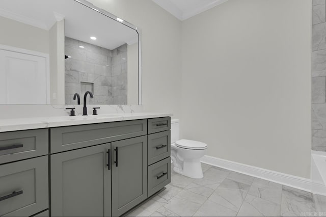 bathroom featuring crown molding, vanity, and toilet