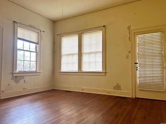 empty room featuring hardwood / wood-style floors